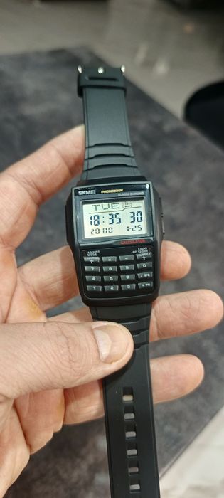 Zegarek męski z kalkulatorem jak nowy