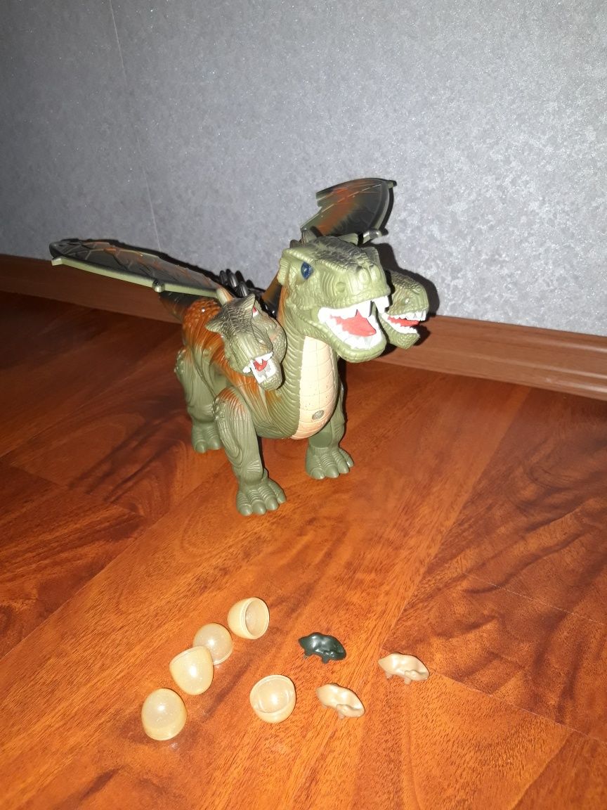 Продам  игрушку дракон/динозавр