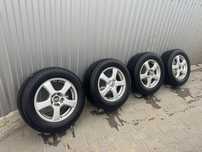 Диски титанові універсальні R16 5*114,3; 5*108 із зимовою гумою