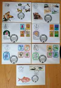 Envelopes e postais com selos carimbados