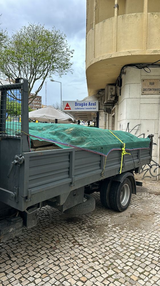 Recolha de entulho com carrinha