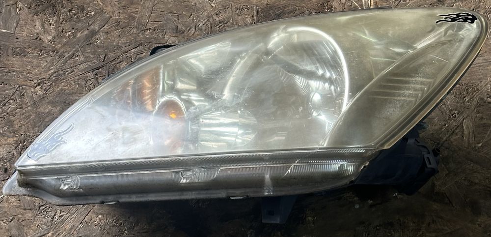 Фара ліва Mitsubishi Lancer 9