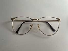 złote oprawki od okularów