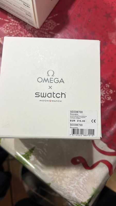 Omega x Swatch Snoopy SO33W700 Biały Minimalizm