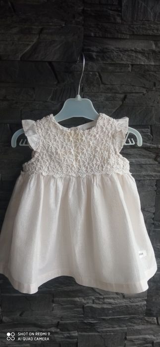 Kremowa świąteczna sukienka Newbie r. 68