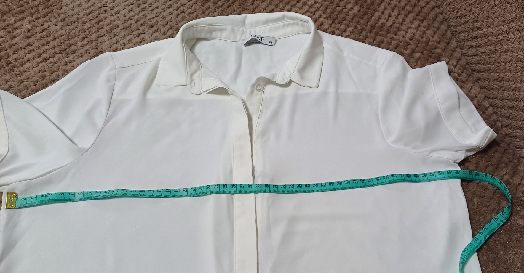 Продам блузку KIWE