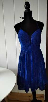 Prześliczna ciemnoniebieska sukienka brokatowa 44