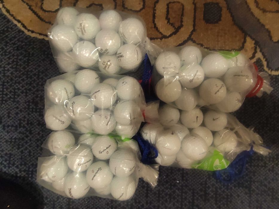М'ячі для гольфу TaylorMade, super Newing, Lancelot, Titleist
