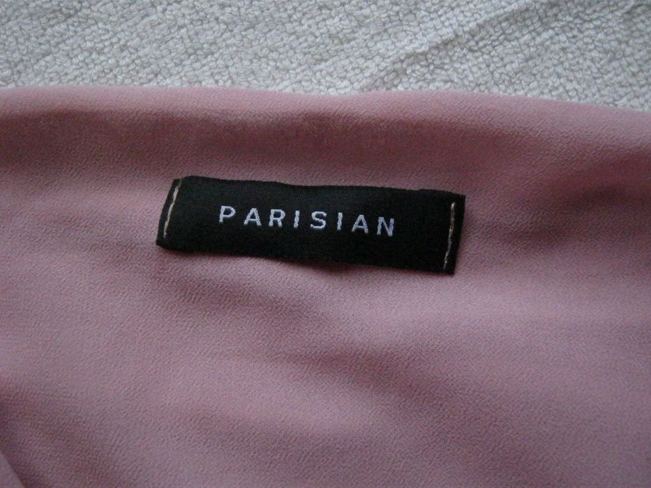 Рожевий топ з об'ємними рукавами