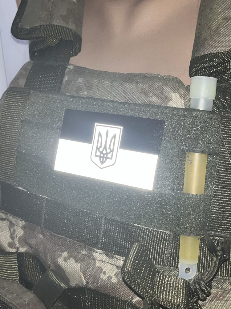 Шерон рефлективний  Герб