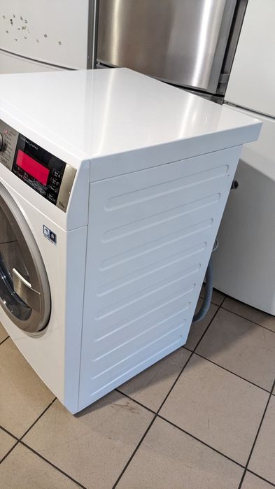 Прально-сушильна машина AEG. L99697HWD