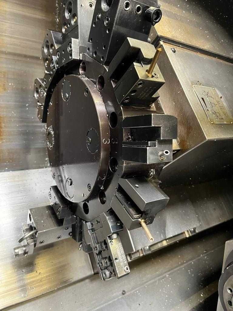 Токарний з ЧПУ, котршпиндель, 2 осі С, оснащення SCHAUBLIN 42S TM-5