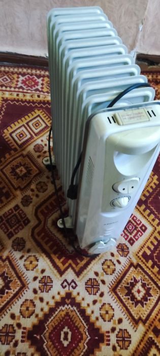 Бытовой масленный радиатор.