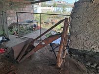 Carregador traseiro com hidráulico