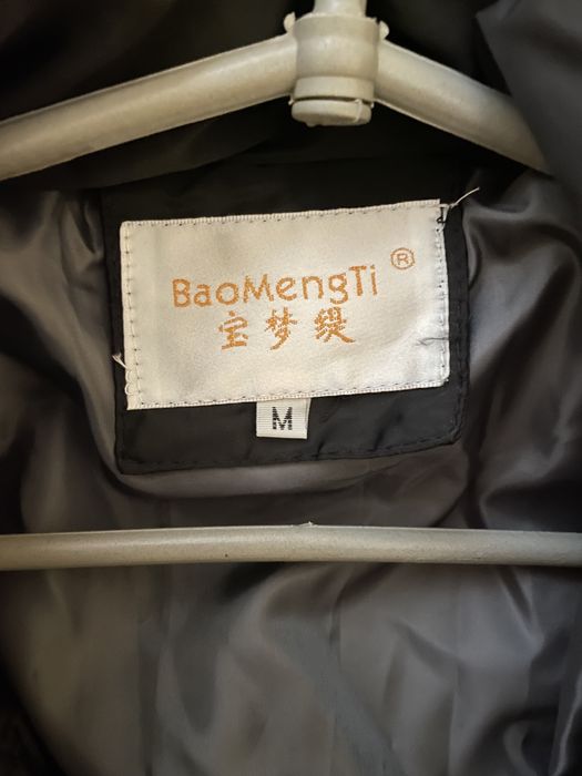 Пуховик зимовий жіночий