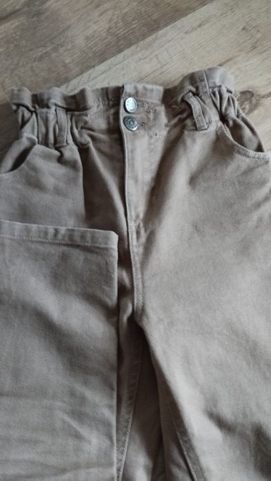 Spodnie jeansy brązowe 140 146 szerokie