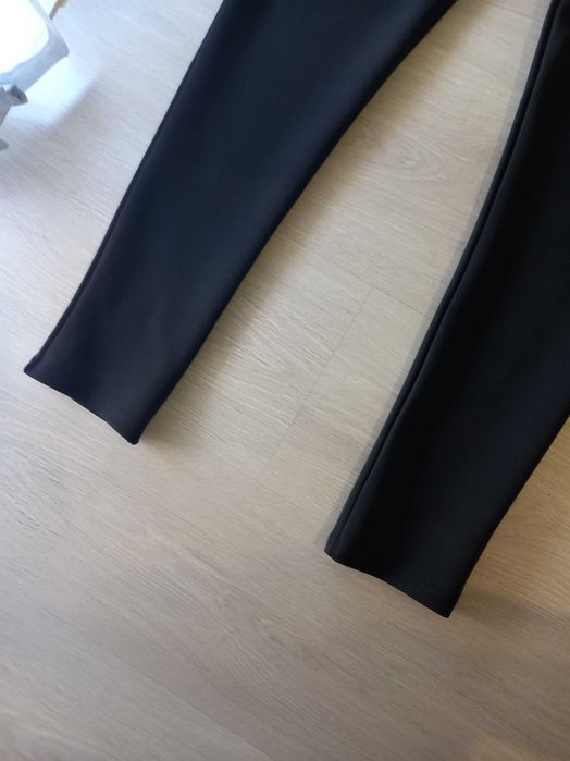 Macacão lantejoulas preto