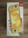 Nintendo Switch Lite (Żółte) + Dwie gry (pokemon)