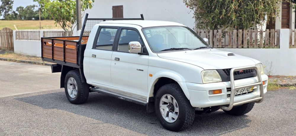 Mitsubishi L200 4x4 (230 mil km)ano 1999 a diese(caixa de madeira nova