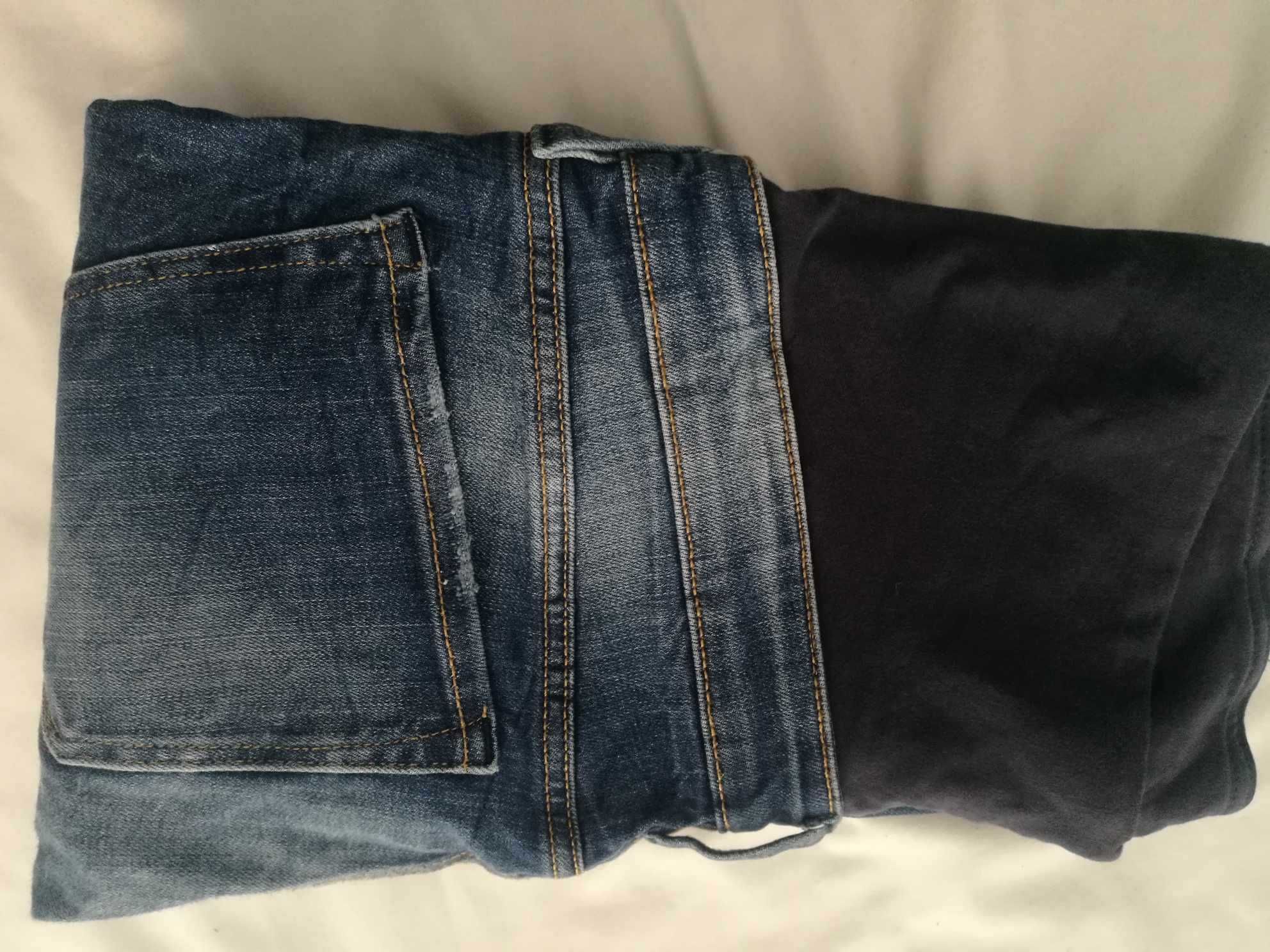 Ciążowe spodnie jeansowe z dziurami.