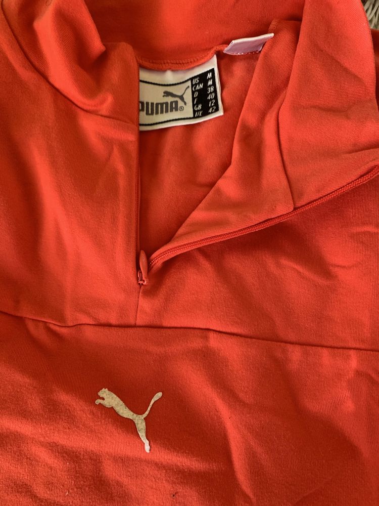 Camisolas,blusas da marca Puma.Preta e laranja.