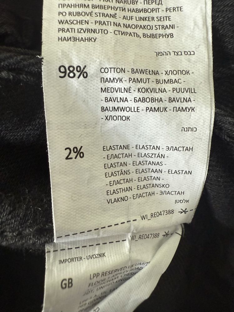 Czarne jeansy push up Reserved