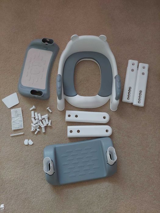 Nakladka/podnozek na sedes