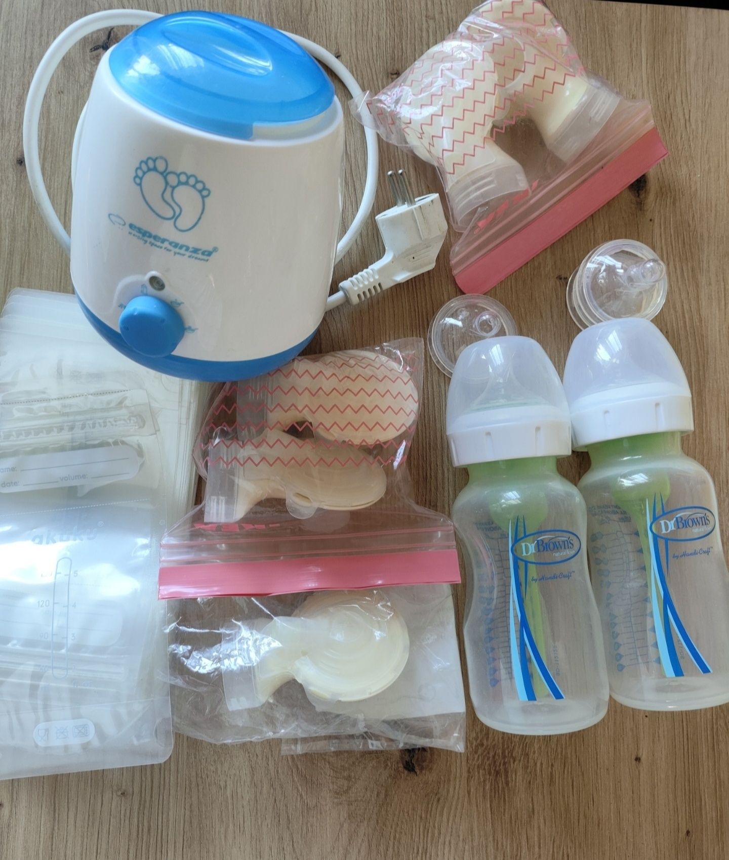 Laktator Medela Swing Maxi + calma