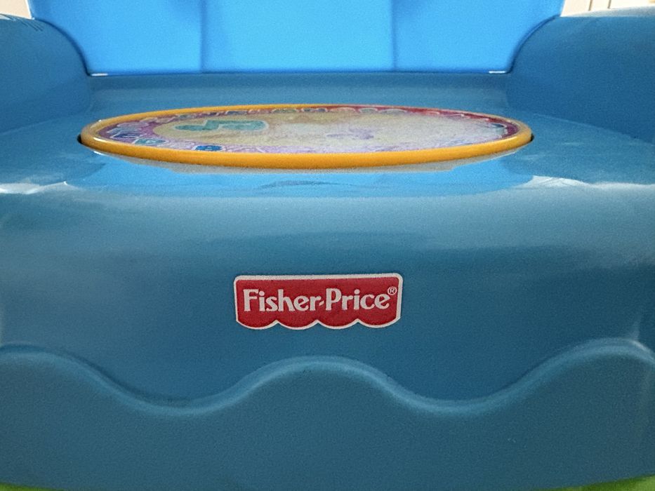 Krzesełko grające Fisher Price
