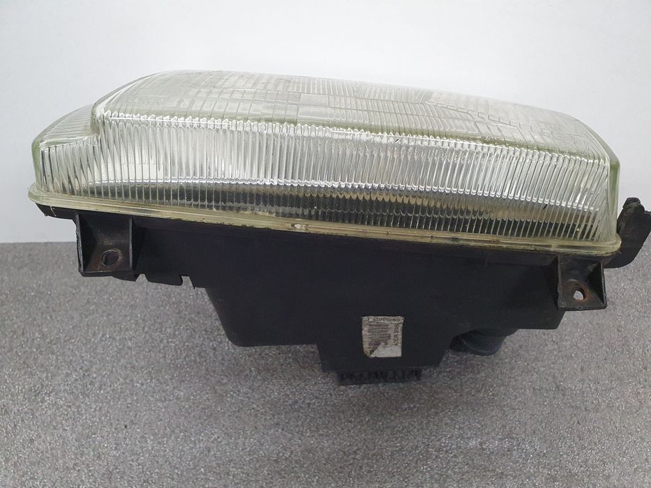 Ótica / farol esquerda VOLKSWAGEN Polo Variant (6V5)