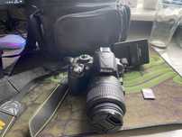 Nikon D3100 + obiektyw 18-55 mm + etui + ładowarka + karta SD