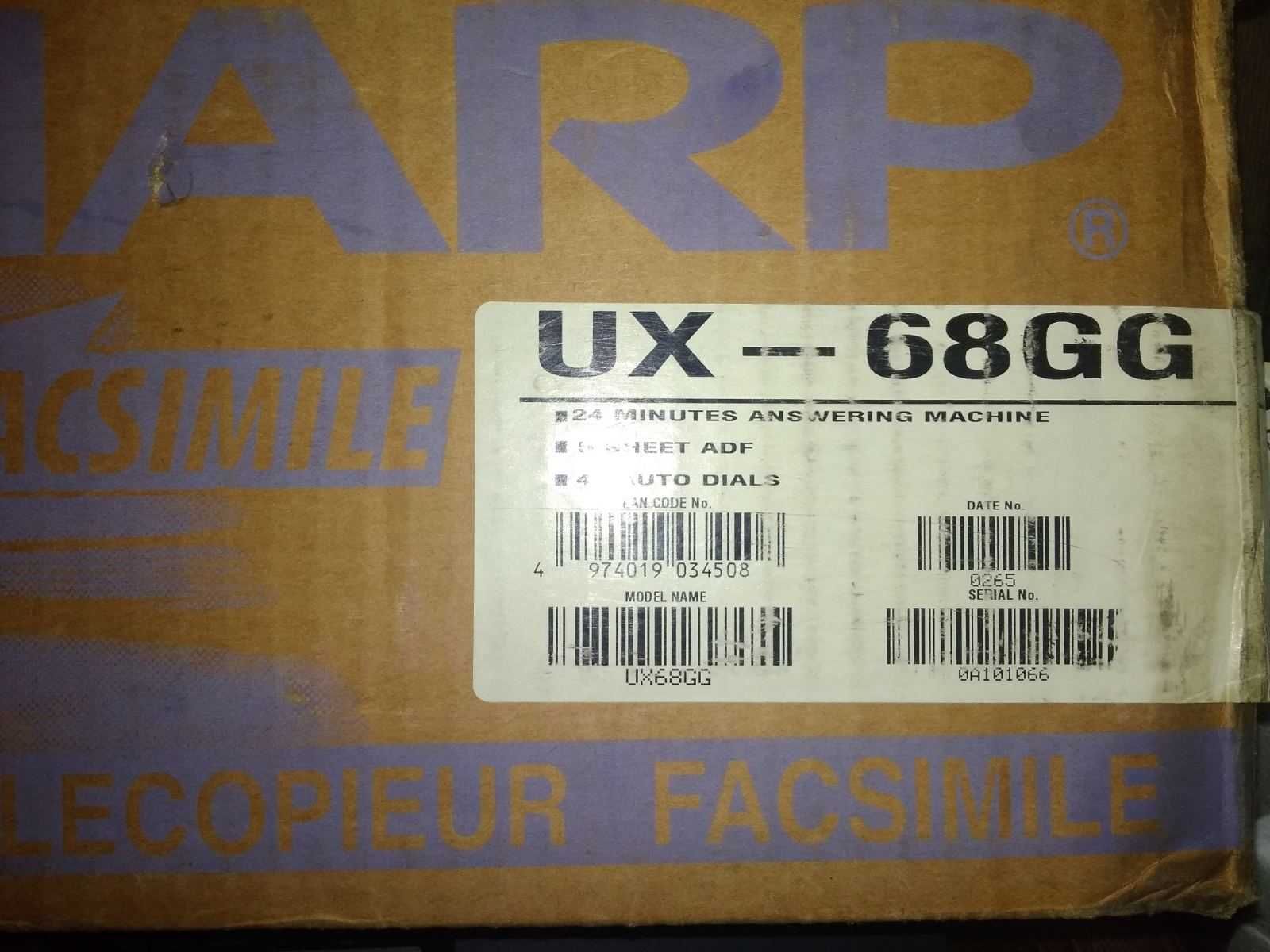 Продам в упаковке фирменій факс SHARP