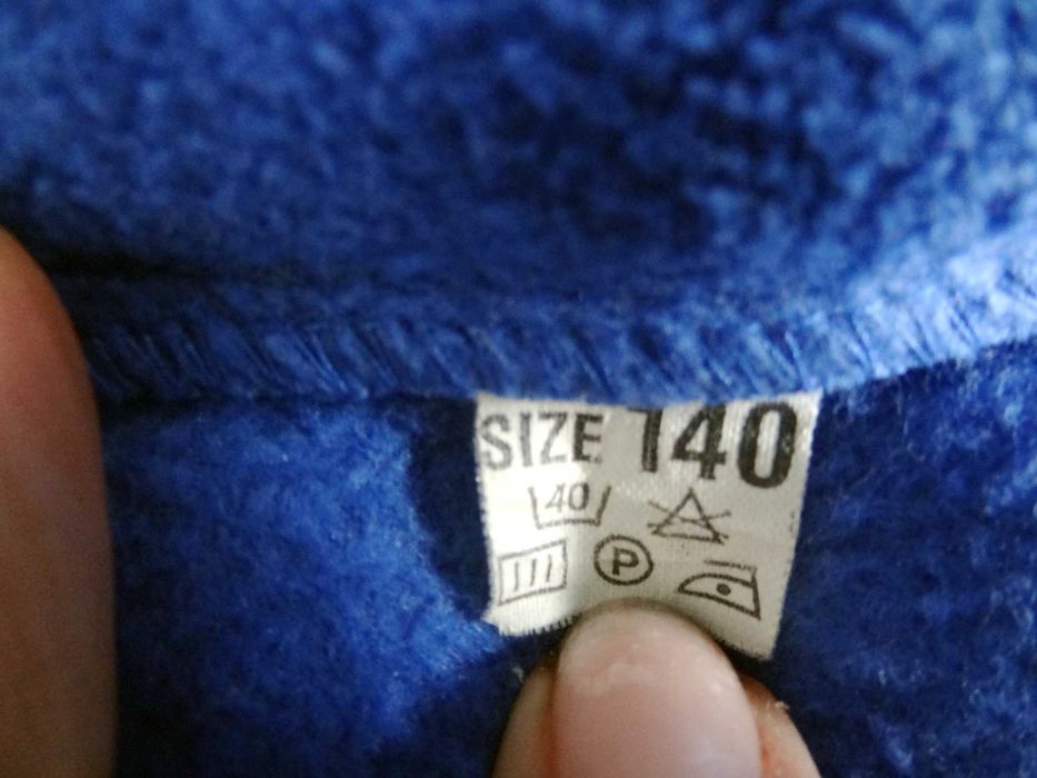 Ciepły bezrękawnik z polaru na zamek, rozm. 140 cm.