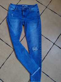 36 spodnie jeans Sinsay dziury