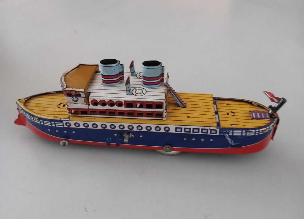 Barco brinquedo de folha antigo