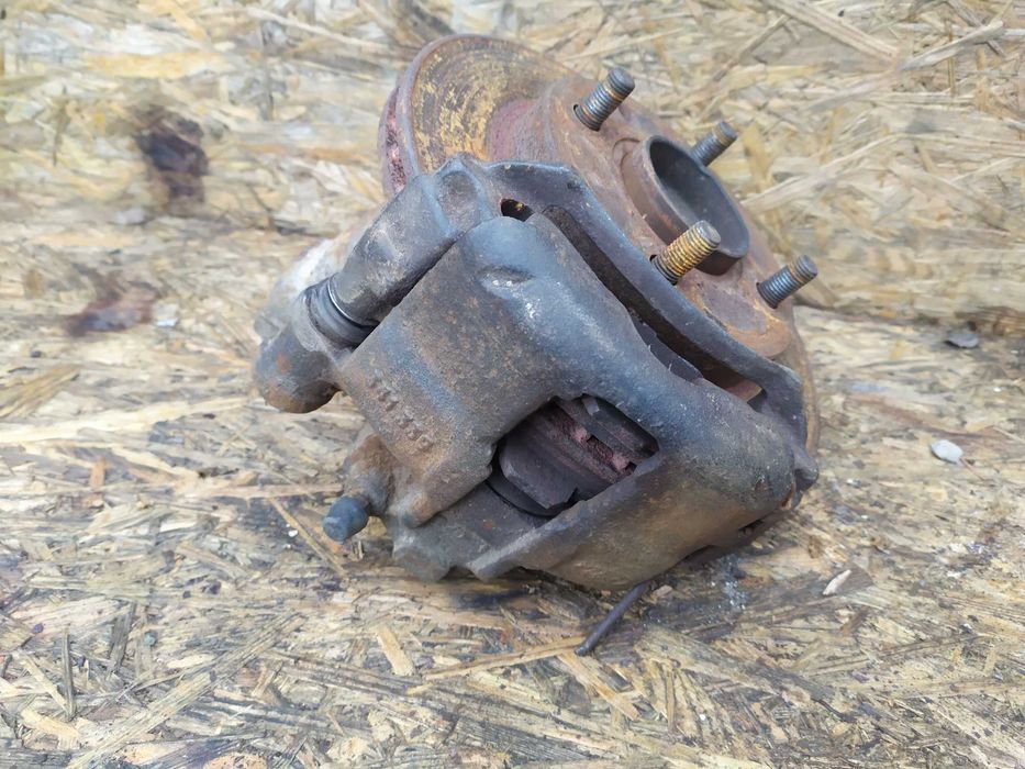 Супорт передній правий  Форд Ескорт 1.8 Ford Escort Mk7