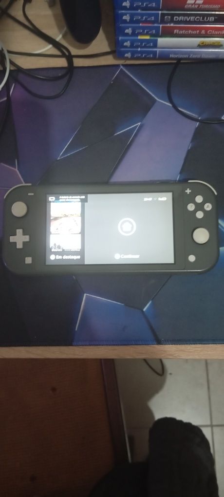 Nintendo switch lite e 4 jogos