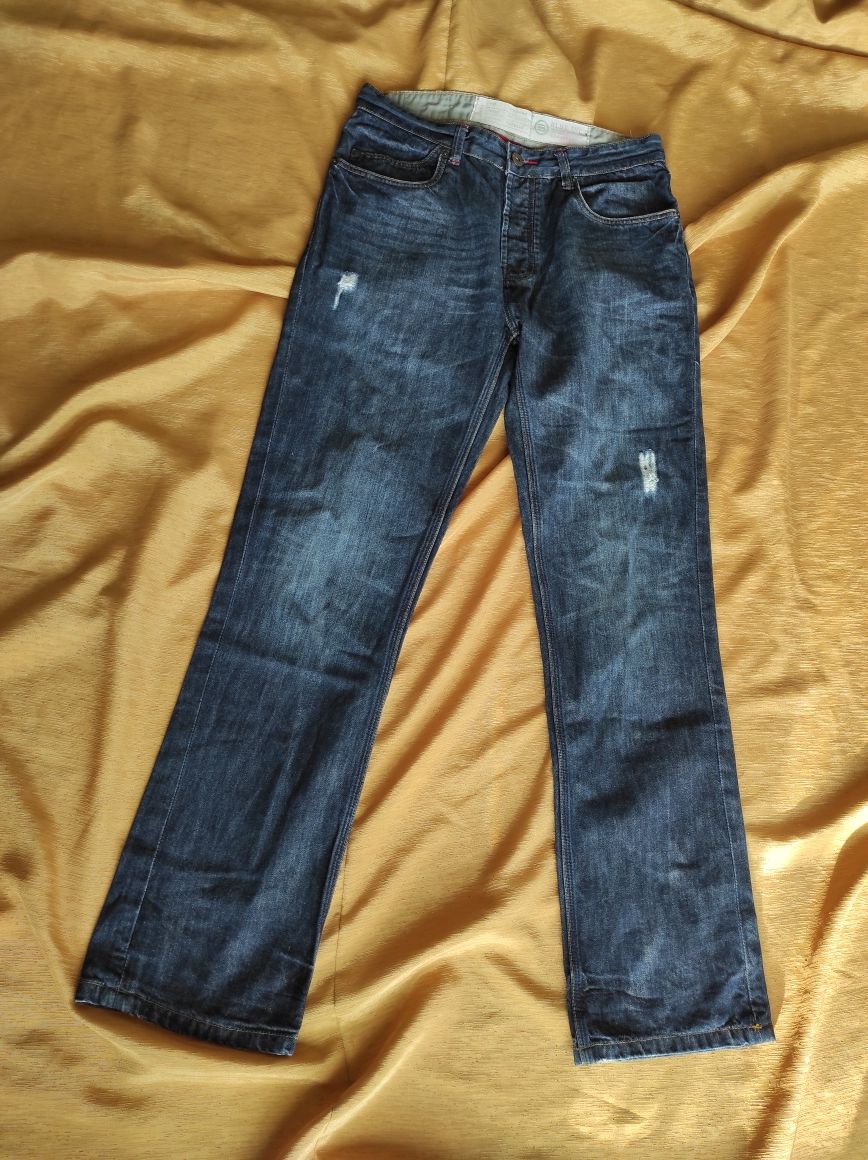 Fajne spodnie jeansy z przetarciami Blue Inc r. W34L34 pas 88cm