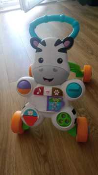 Sprzedam interaktywnego pchacza firmy fisher price