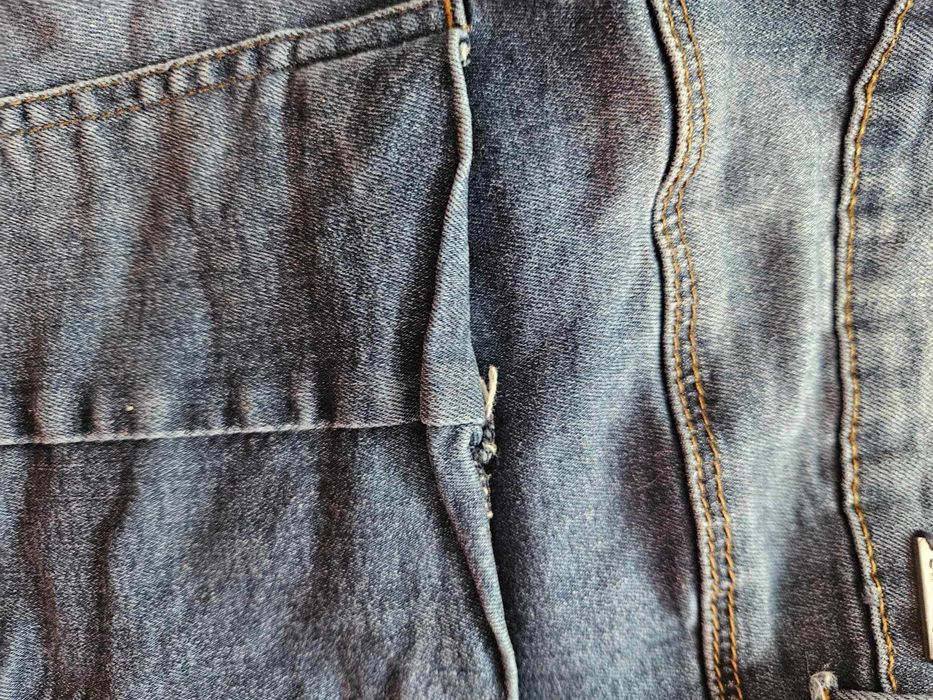 Spodnie jeansowe Sinsay 40