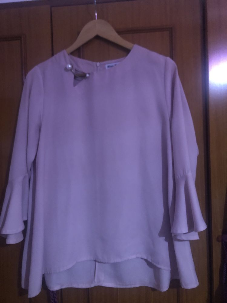 Blusa rosa velho clara