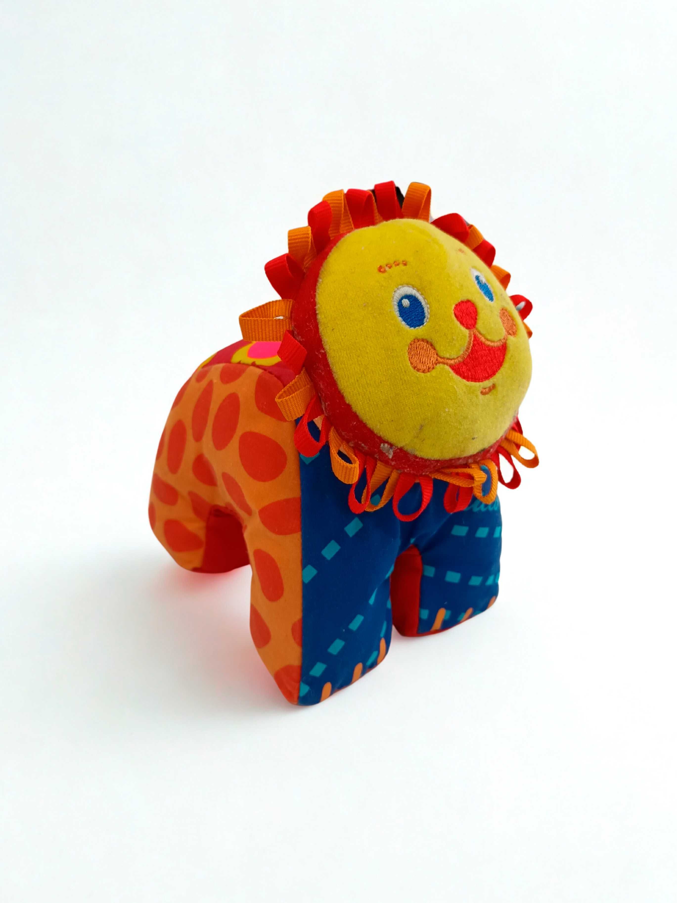 Leão colorido de peluche