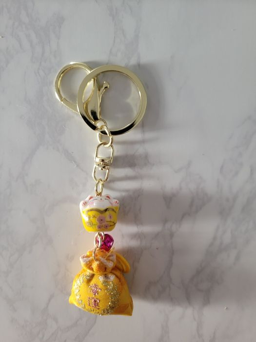 Porta chaves dourado