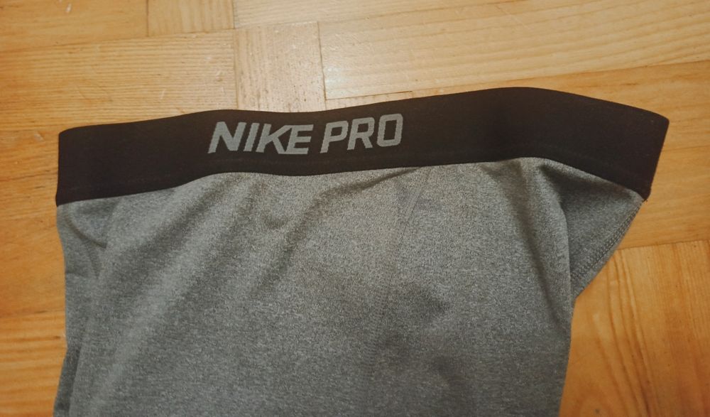 //Legginsy damskie szare sportowe Nike. M