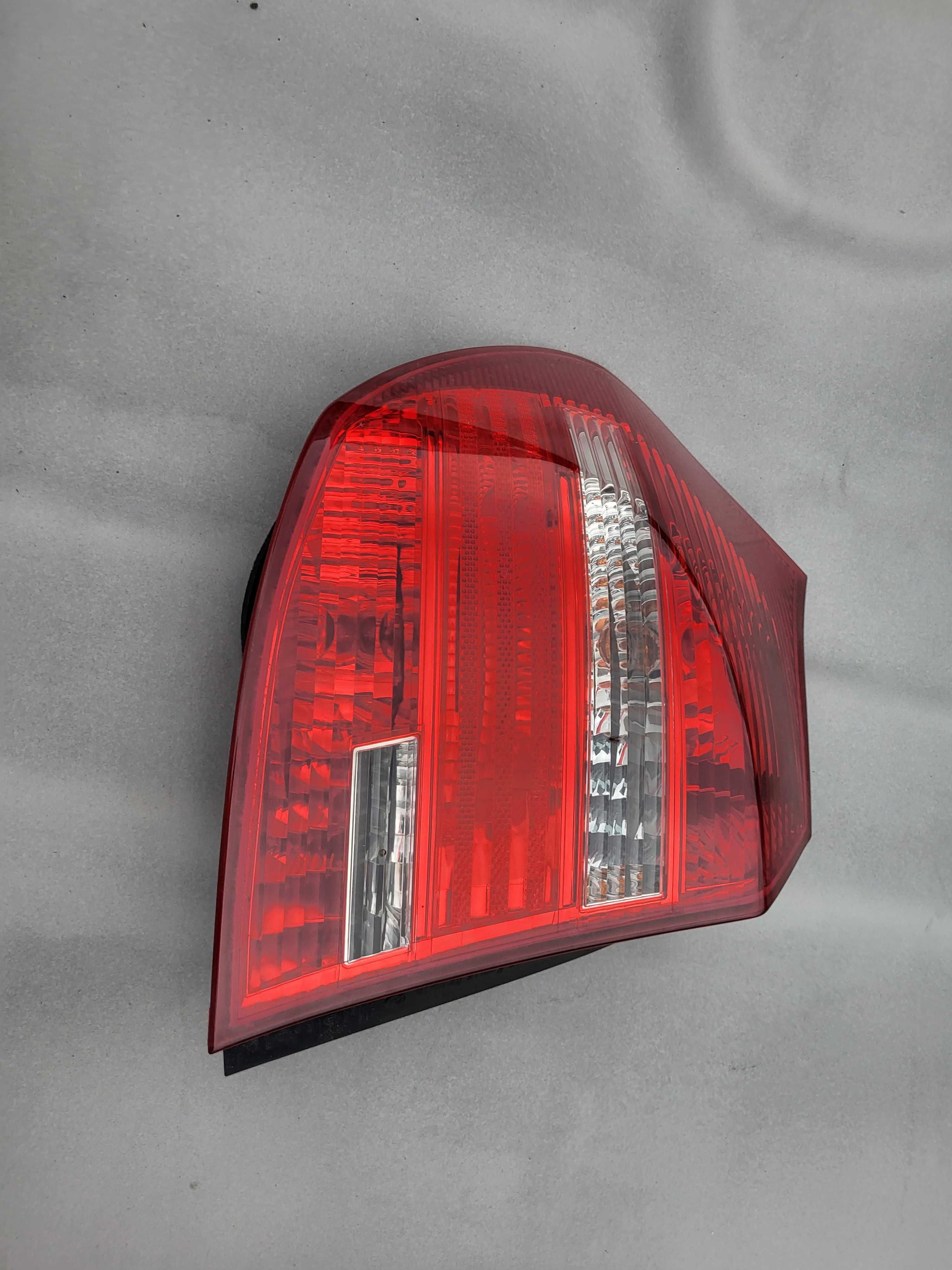 lampa reflektor BMW e87 serii l