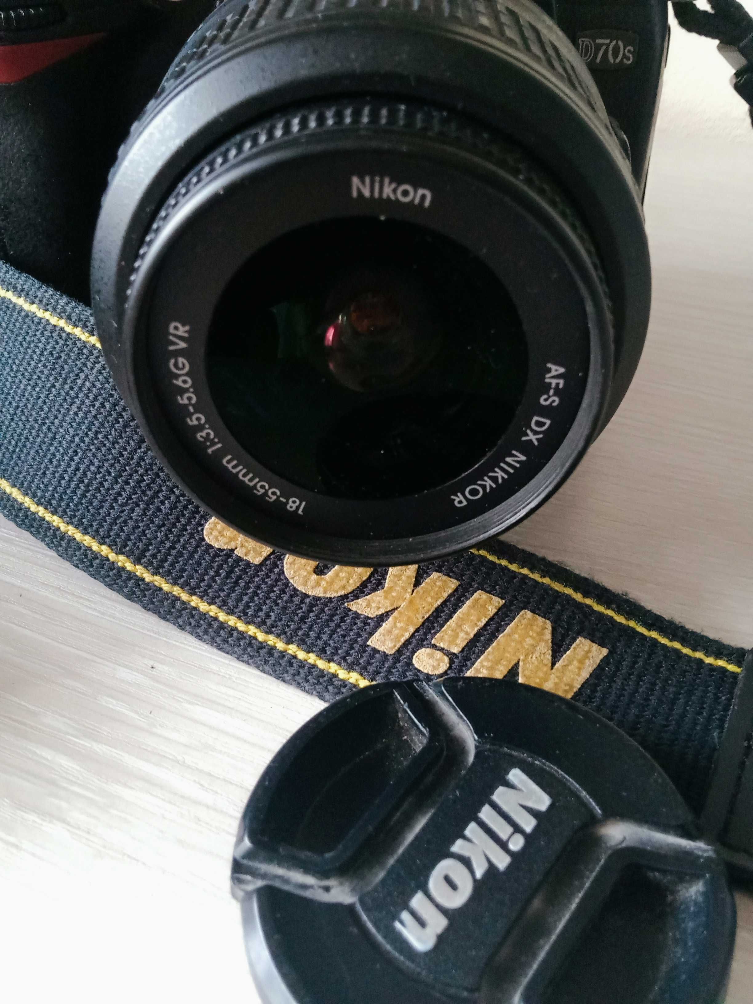 ЗУМ обєктиви та професійний фотоапарат Nikon