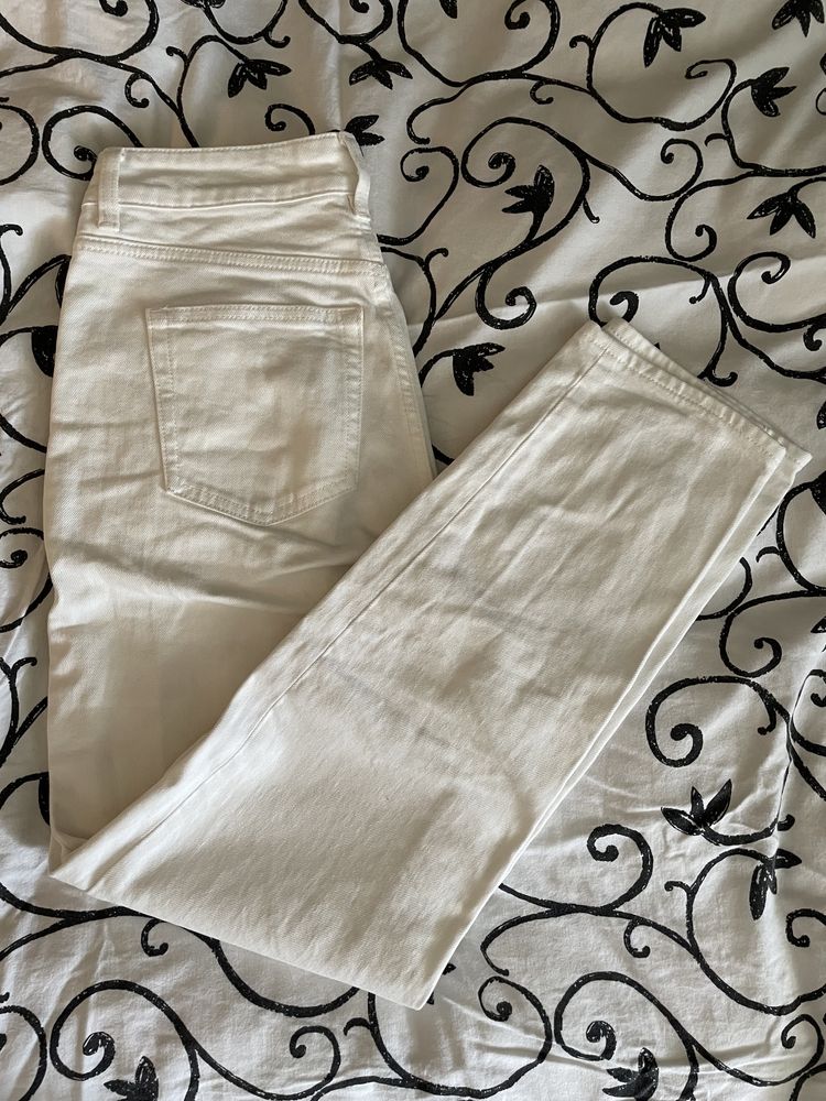 Białe spodnie jeansy H&M rozmair 34
