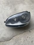 Farol esquerdo Volkswagen Golf 5