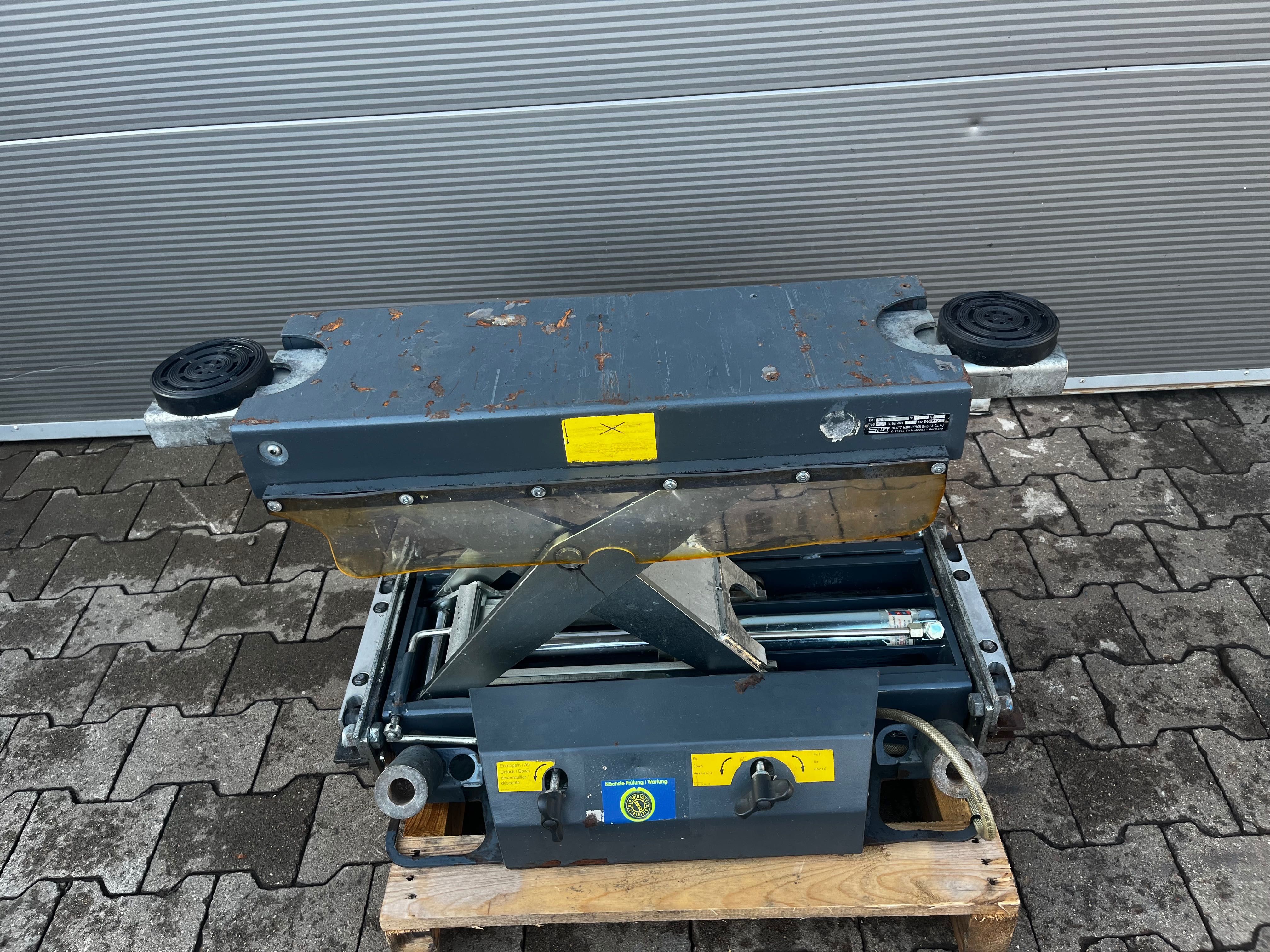 Podnośnik kanałowy pneumatyczno-hydrauliczny Slift 2200 kg