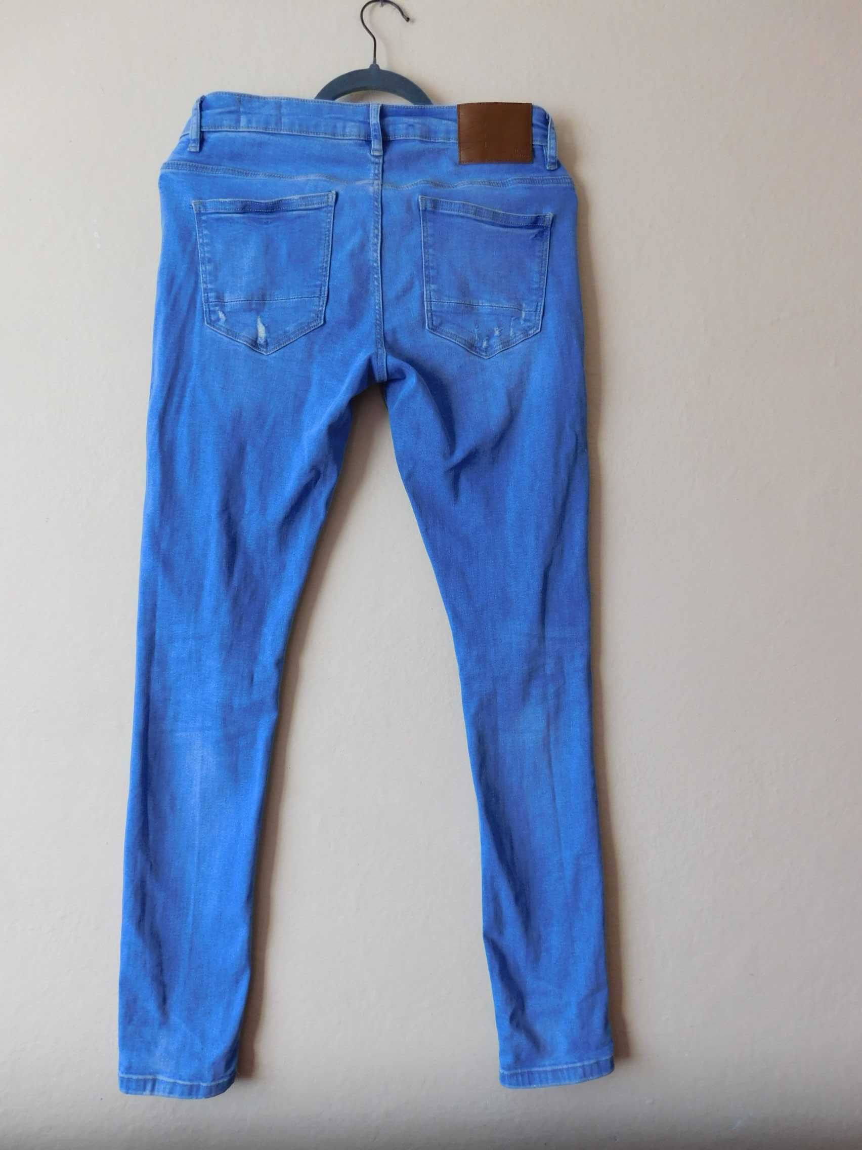 Denim & Co spodnie jeans niebieskie dziury 40 42